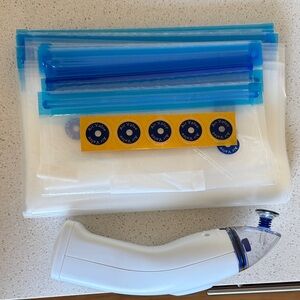 Handi vac + reusable bags